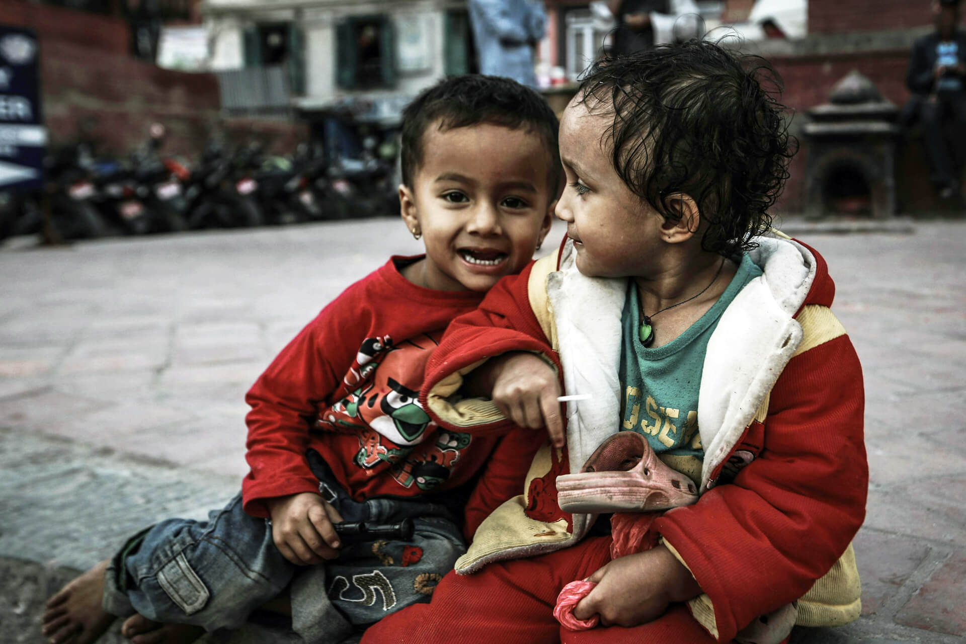 Two young children sitting