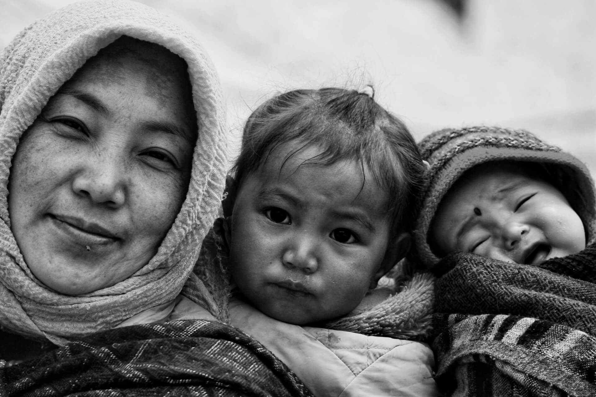 Woman and young children