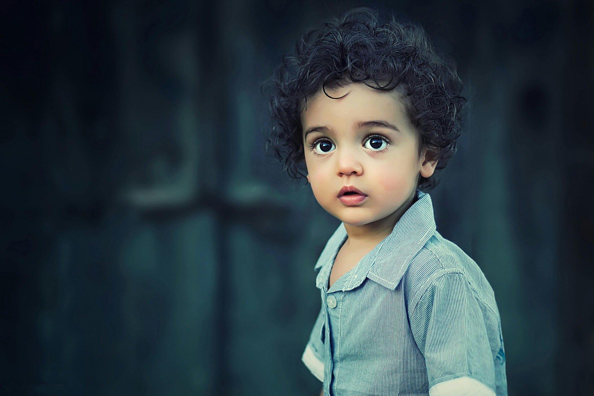 Young child looking far