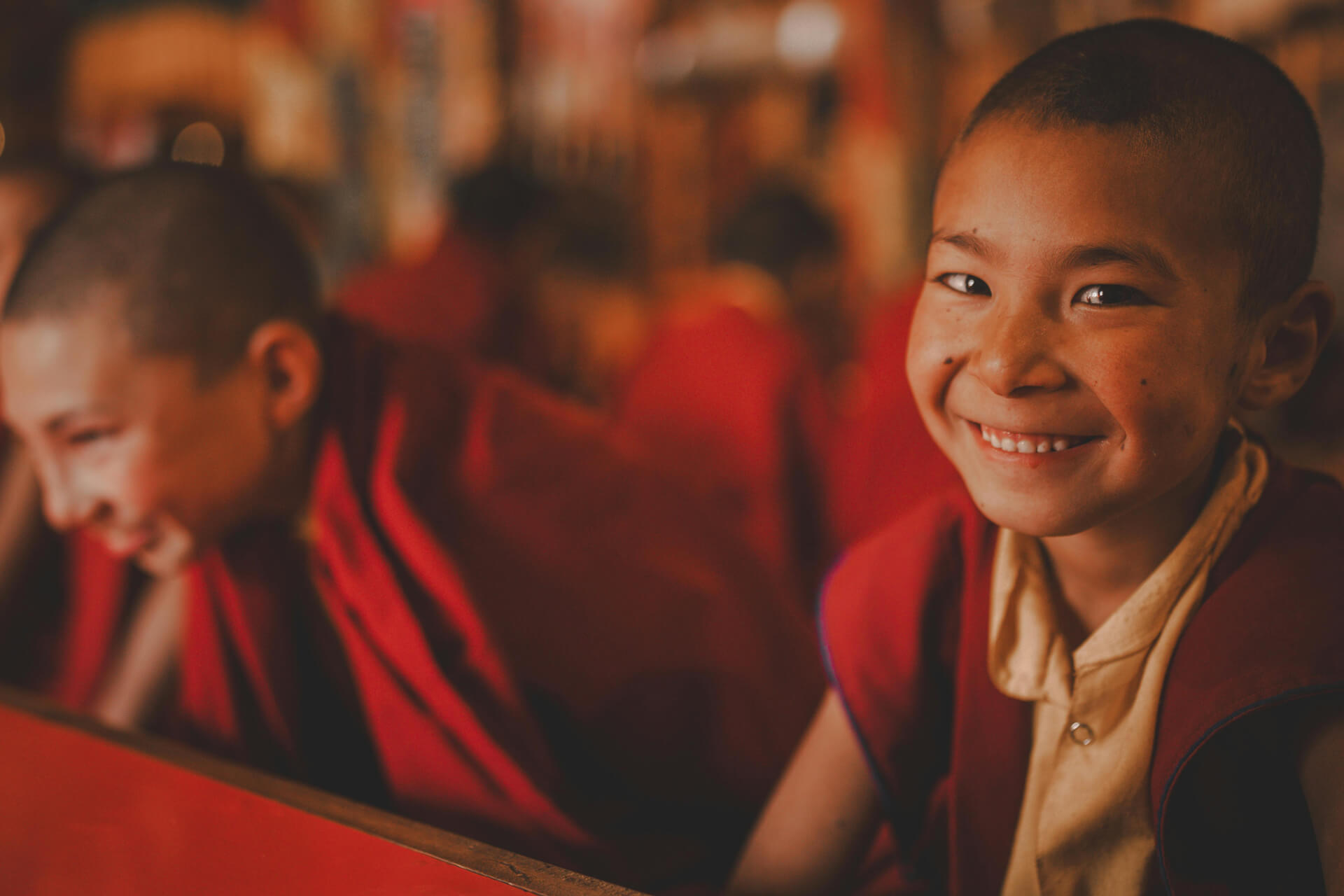Young child monk smiling